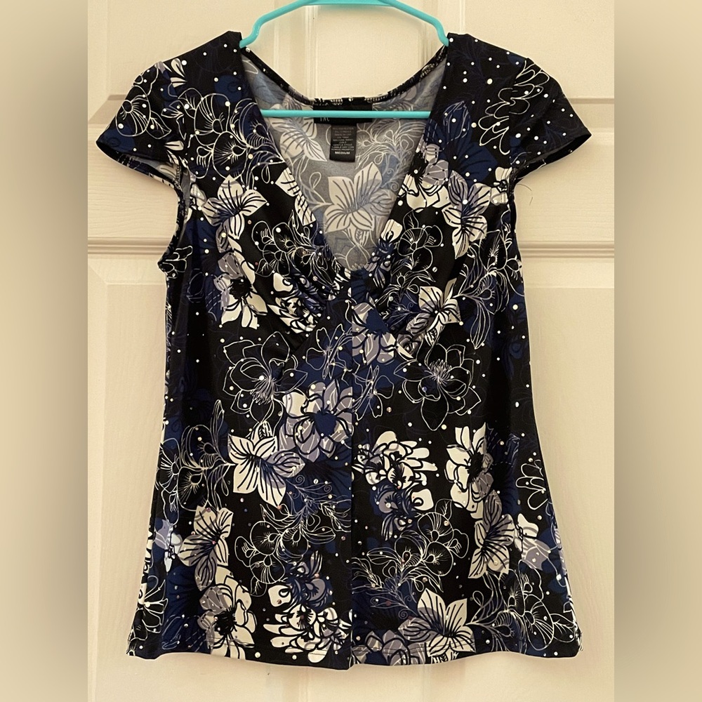 Medium sparkly v-neck top.